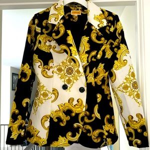 Black, white and gold, long sleeve blazer. Size large fits like medium.